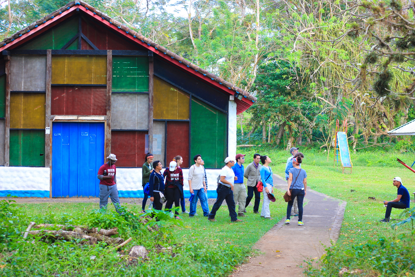 Group of students experiencing a new culture and a colorful building