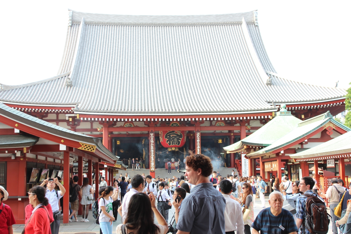 crowd in front of a Buddhist temple