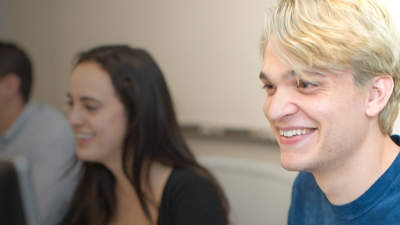 Computer science students sitting in a classroom