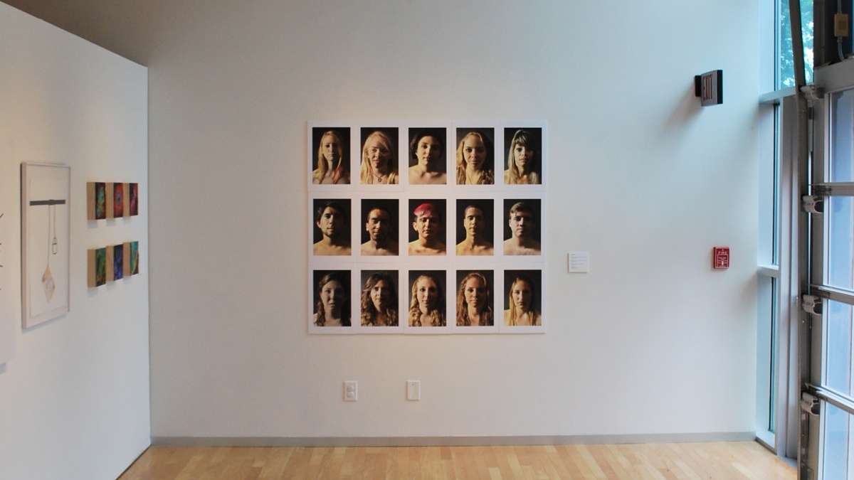 Art gallery exhibit displayed on a distant wall