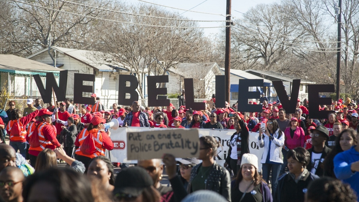 Students participate in a march 